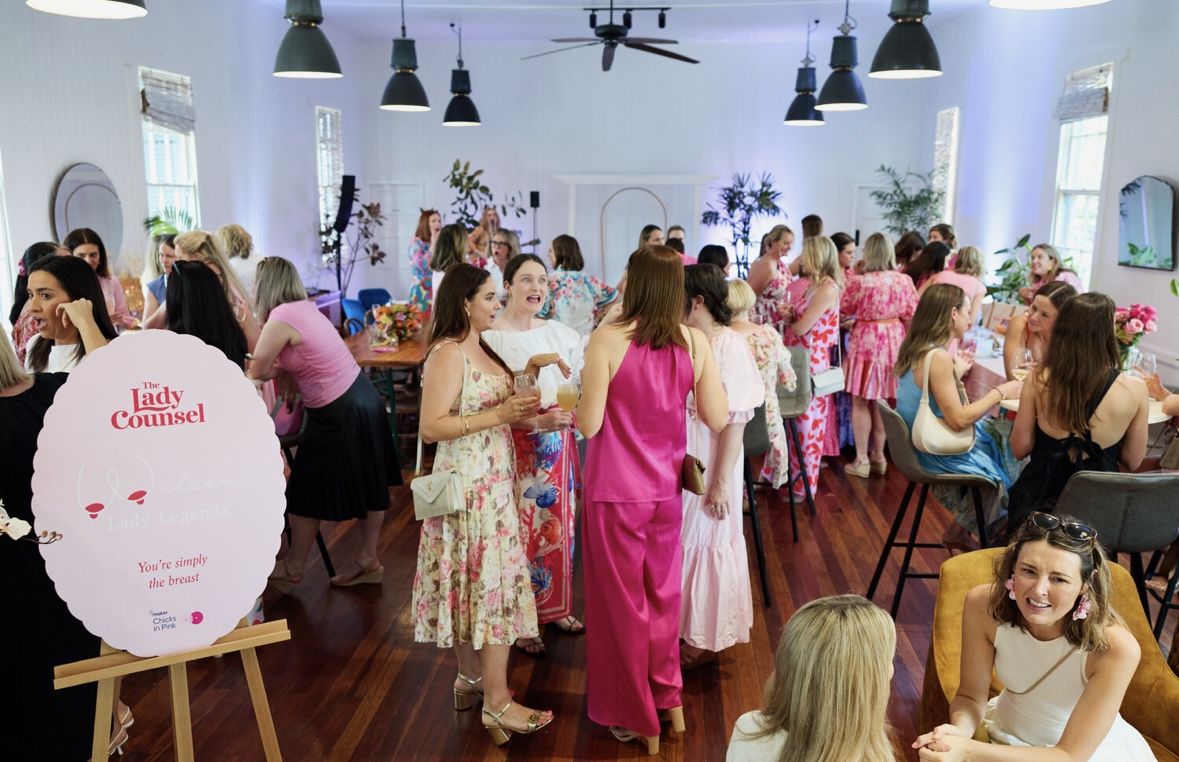 A full room at a breast cancer fundraiser