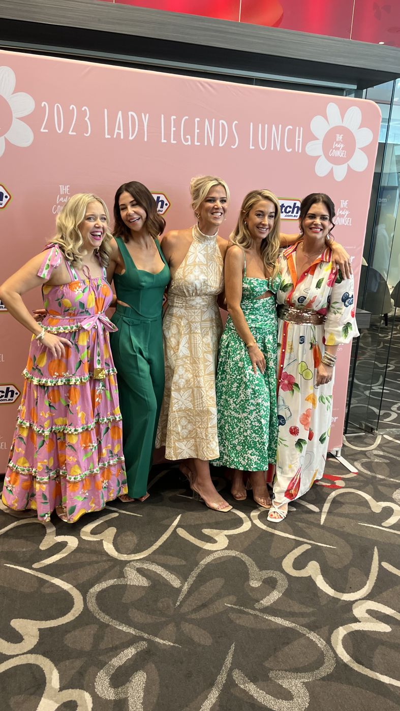 Guests at the 2023 Lady Legends Lunch media wall