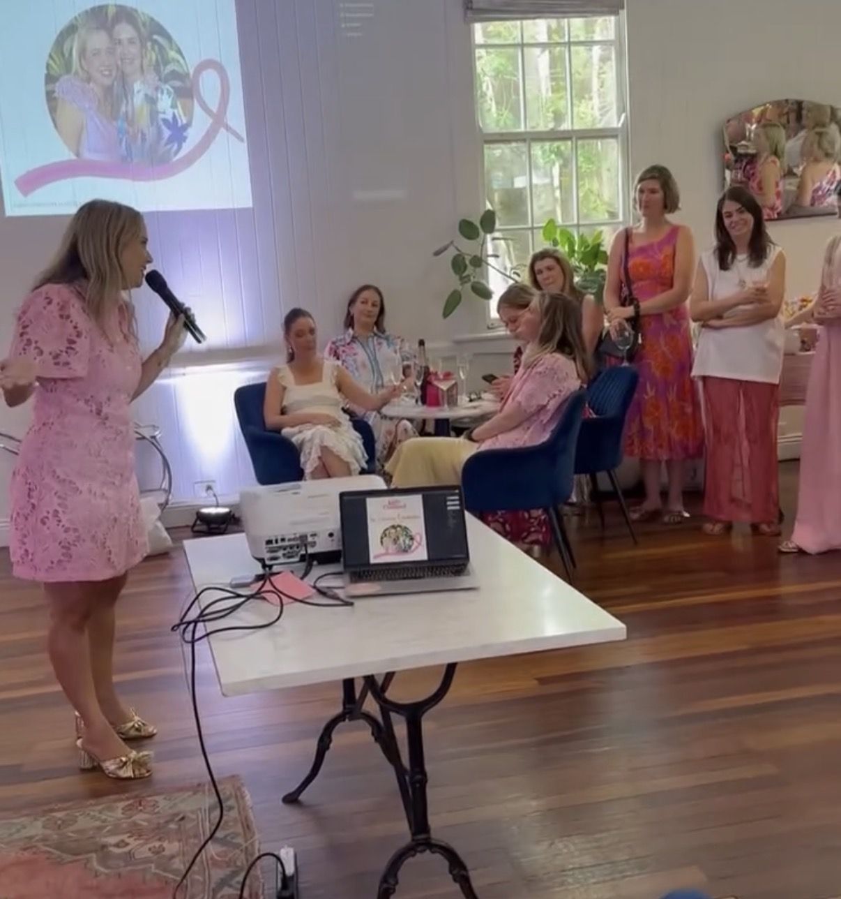 Speaking to guests at a fundraising event